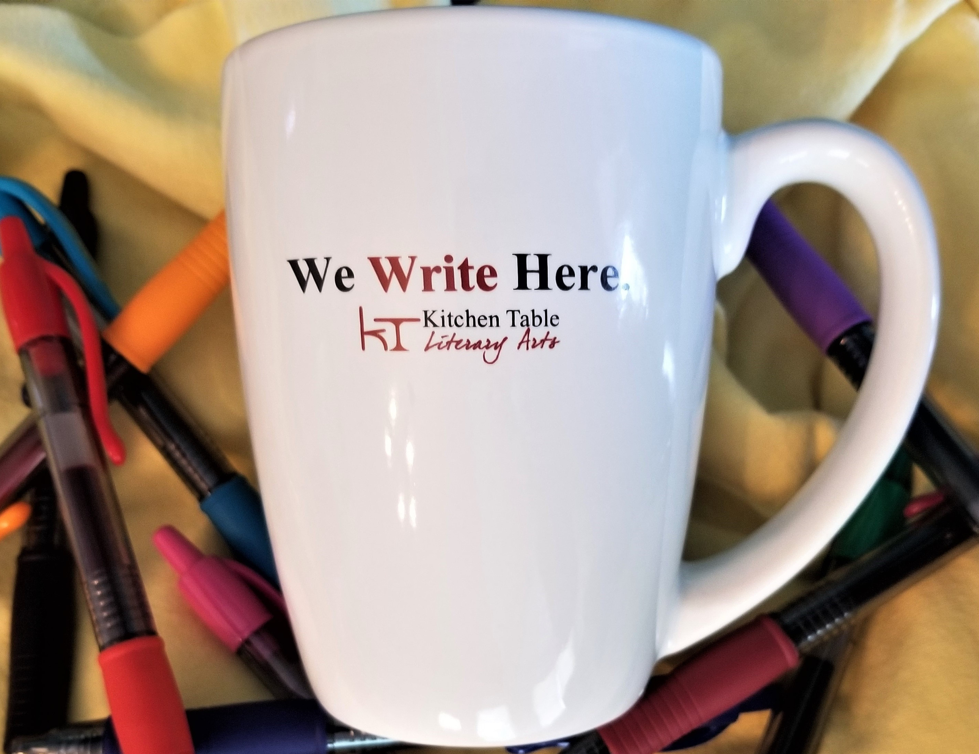 We Write Here Official Kitchen Table Lit Mug